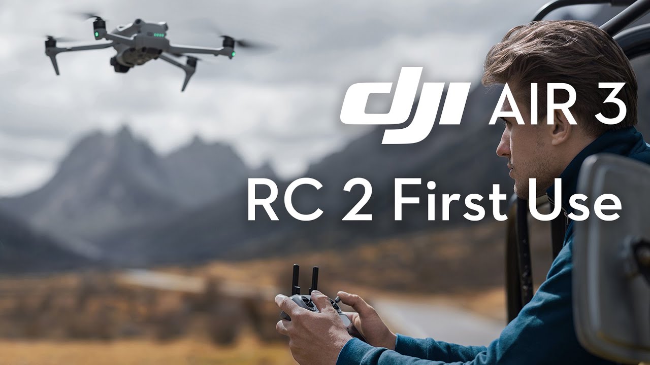 пульт dji rc 2 с экраном в руках оператора на природе